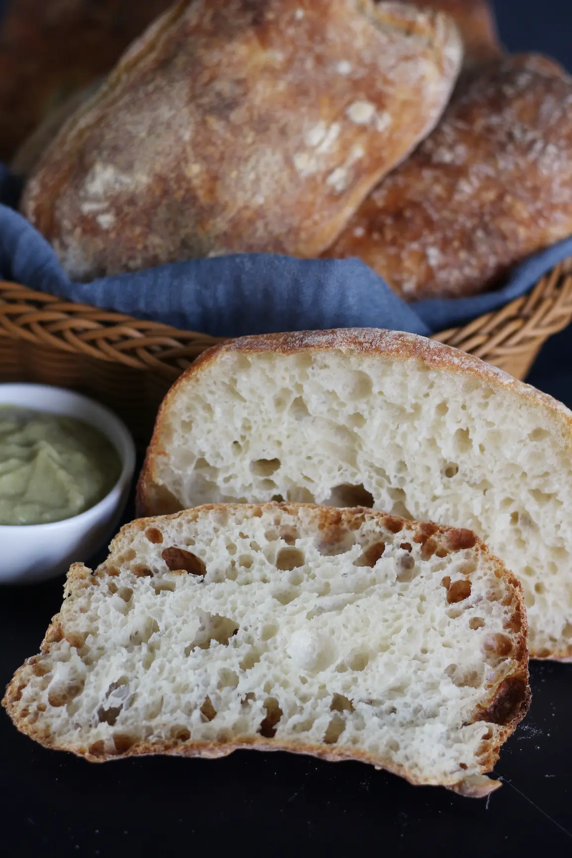 Scoring sourdough bread before baking for a crisp crust
